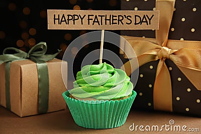 Composition with cupcake and gift boxes on table. Happy Father`s day Stock Photo