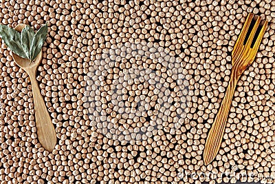 Composition of natural chickpeas with kitchen utensils, spoon an Stock Photo