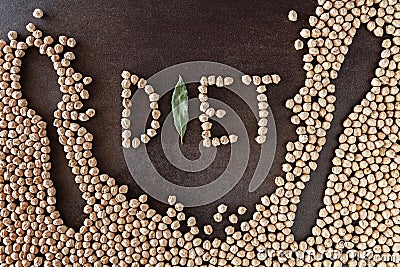 Composition of natural chickpeas with kitchen utensils, spoon an Stock Photo