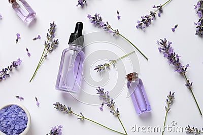 Composition with natural lavender cosmetic products and flowers on white background Stock Photo