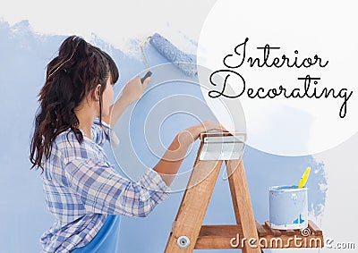 Composition of online crafting text over woman painting wall Stock Photo