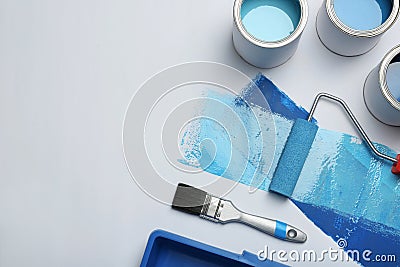 Composition with paint cans on white background Stock Photo