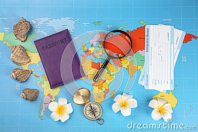 Composition with passport, immigration bureau cards and compass on world map. Travel planning concept Stock Photo