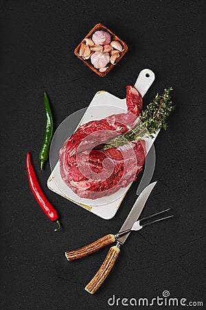 Composition with raw beef whole tenderloin Stock Photo