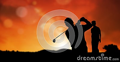 Composition of silhouette of golf players over orange sky with copy space Stock Photo