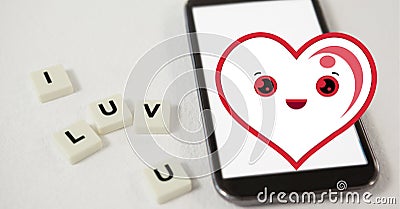 Composition of smiling heart icon over smartphone and i luv u text on white squares Stock Photo