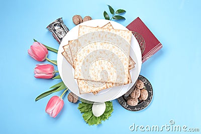 Composition with symbolic Passover Pesach items on color background Stock Photo