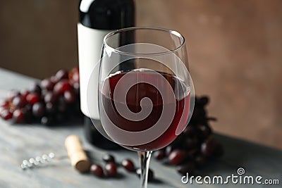 Composition wine, cork and grape on wooden table Stock Photo