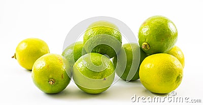 Composition of a yellow and green lemons and lime on a white background Stock Photo