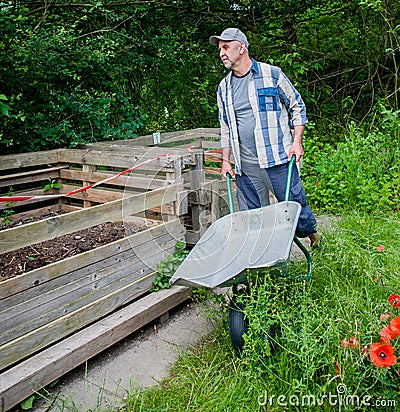 Compost bins with humus Stock Photo