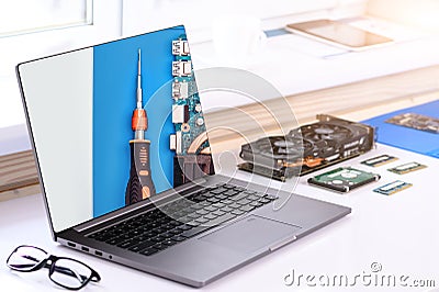 . Computer assembly courses. There is a computer and parts on the table. Repair of gadgets. Online learning Stock Photo