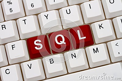 Computer coding with SQL on a keyboard Stock Photo