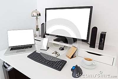 Computer and devices on modern white desk interior 3D rendering Stock Photo