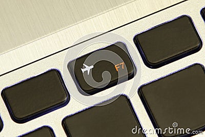 Computer f7 key turn on off flight airplane safe mode Stock Photo