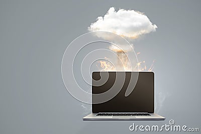 Computer failure - mushroom cloud above a laptop Stock Photo