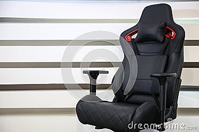 Computer gaming chair on a striped background Stock Photo