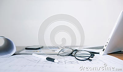 Computer glasses and documents on the desk Stock Photo