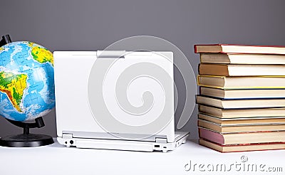 Computer, globe and books. Stock Photo