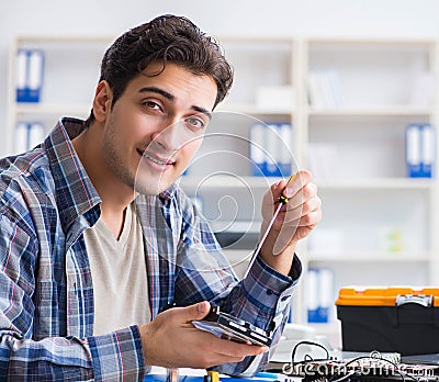 Computer hardware repair and fixing concept by experienced techn Stock Photo