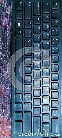 Computer keyboard Black on wood table , black keyboard. Stock Photo