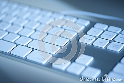 Computer keyboard in blue Stock Photo