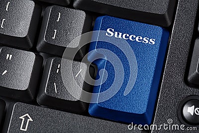 Computer keyboard blue key with Success label inscription. Business concept. Close up image Stock Photo