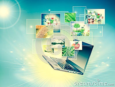 Computer mobility, internet communication and cloud computing concept: laptop with cloud of color application icons Stock Photo