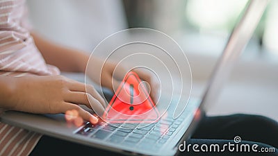 Computer notification error maintenance concept. programmer, or developer using a computer laptop with a triangle warning Stock Photo