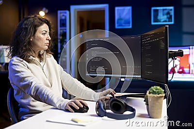 Computer scientist doing software debugging on PC at home Stock Photo