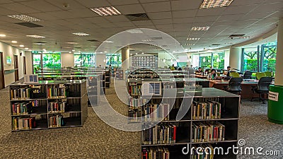 Computer station at the university library timelapse hyperlapse with seating area in the foreground. Editorial Stock Photo