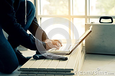 Computers are used by black hackers to steal or attack data on servers. Cybercrime on the internet is a growing problem. Work in a Stock Photo