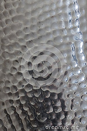 Concave peened silver metal texture background Stock Photo