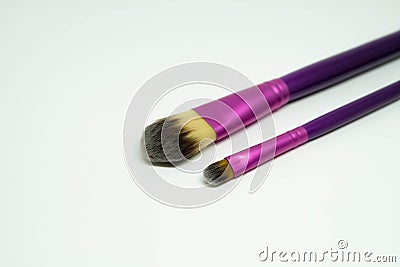 Concealer brush and foundation brush in pink purple handle Stock Photo