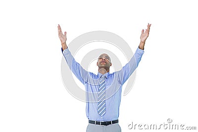 A concentrated businessman with arms up Stock Photo