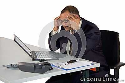 Concentrated mature businessman Stock Photo