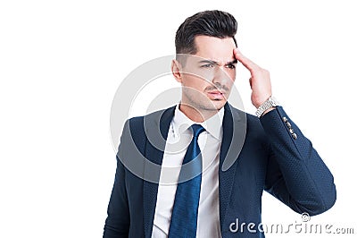 Concentrated and stressed businessman having a migraine Stock Photo