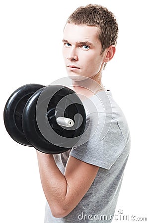 Concentrated young man lift weights Stock Photo