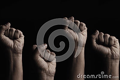 Concept against racism or racial discrimination by showing with hand gestures fist or solidarity Stock Photo