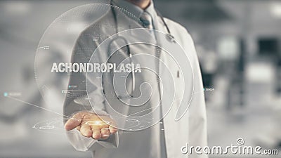 Doctor holding in hand Achondroplasia Stock Photo