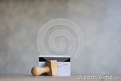 The concept of approved credit card, wood stamp with white credit card. Stock Photo