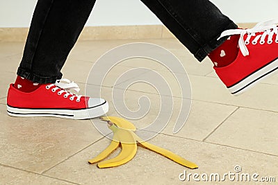 Concept of April Fool`s Day prank with banana peel Stock Photo