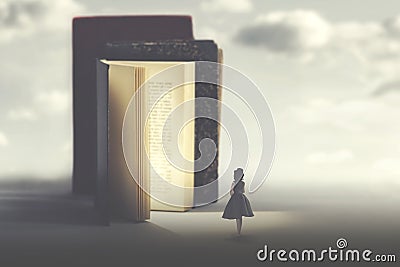 Concept of art and fantasy of a magic book and a small woman Stock Photo