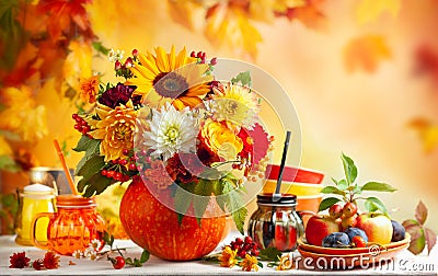 Concept of autumn festive decoration for Thanksgiving day or Halloween. Autumn bouquet of beautiful flowers and berries in a Stock Photo