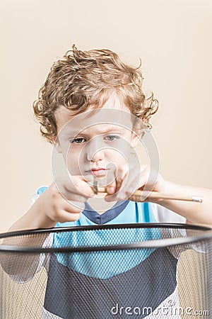 Child sharpening a pencil Stock Photo