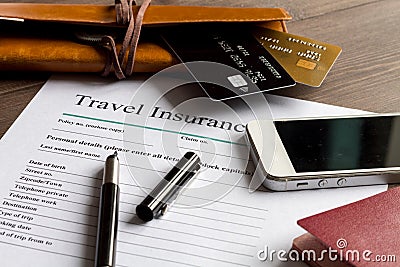 Concept booking travel insurance on wooden background Stock Photo