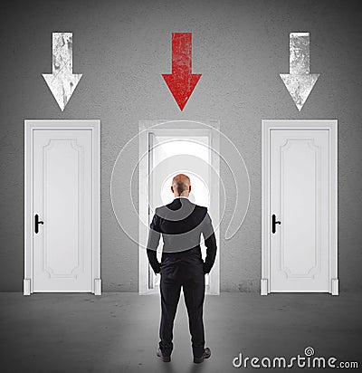 Concept of businessman choosing the right door Stock Photo