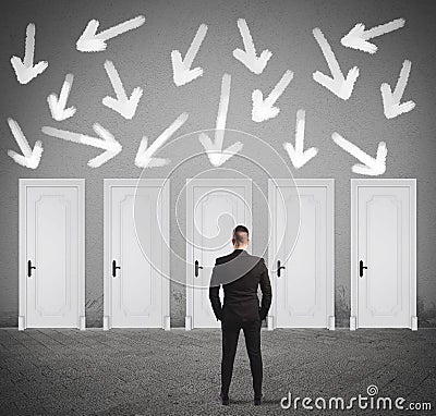 Concept of businessman choosing the right door Stock Photo