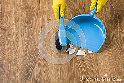 Concept cleaning - sweeping the floor Stock Photo