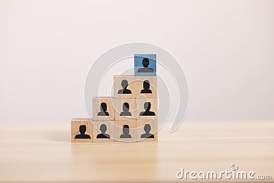 wooden blocks stack to organization stair with people icon. Stock Photo