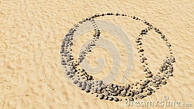 Stones on beach sand handmade symbol shape, golden sandy background, ball sign Cartoon Illustration